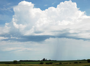 Rain shower over Kansas farm